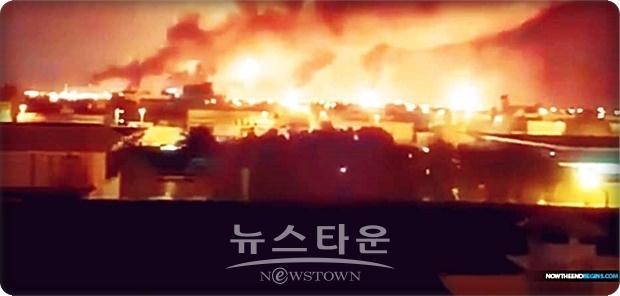 드론 공격을 받아 불타고 있는 사우디아람코(Saudi Aramco) 정유 시설 등. 이제 드론이 '테러무기화' 되고 있음이 증명되고 있다.